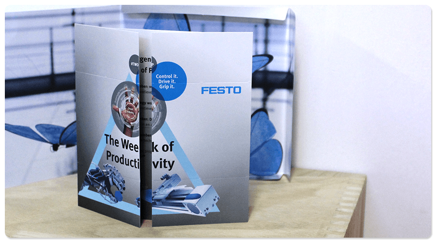 Festo with a full-colour printed envelope and folding card